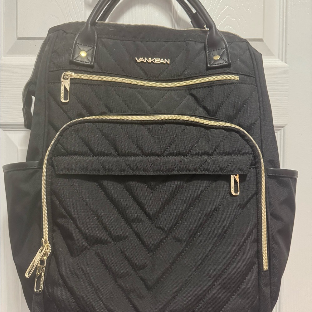 Black Quilted Backpack with Gold Hardware